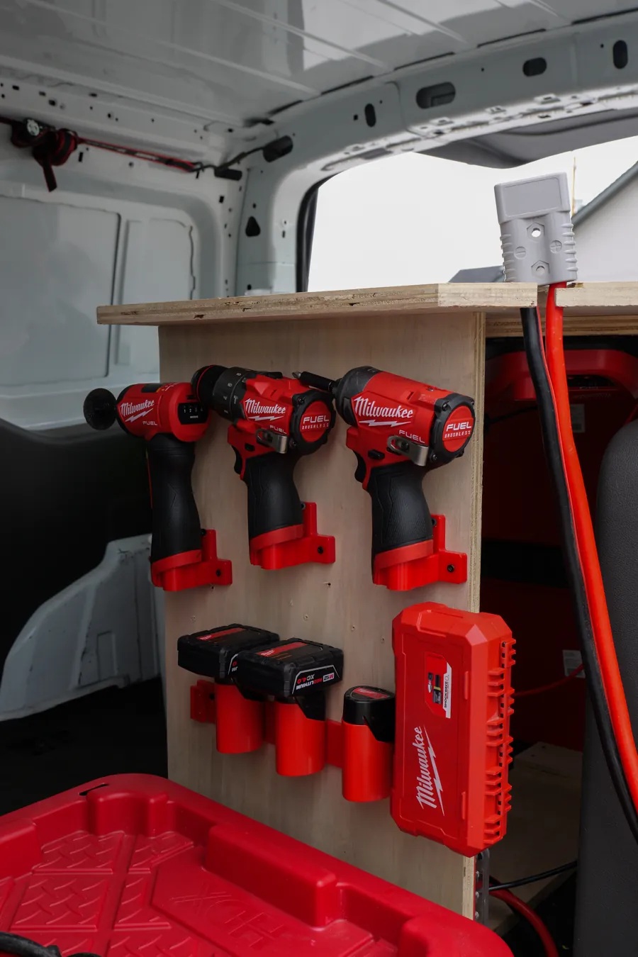 Milwaukee drills and lock installation tools racked in the Key Rescue Washington van, Spokane, WA