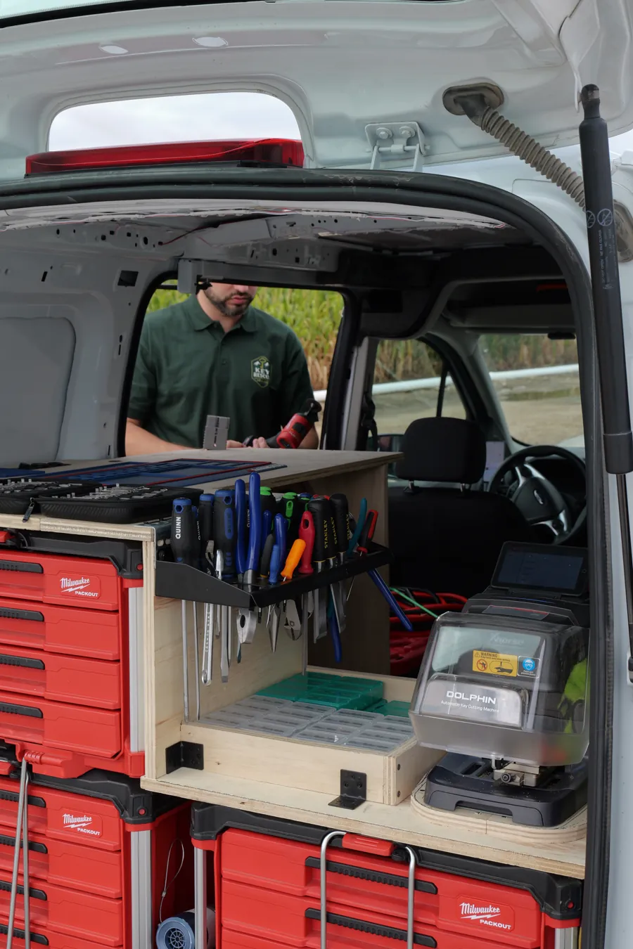 Organized mobile locksmith van interior with pick tools, cylinders and key blanks, Spokane, WA