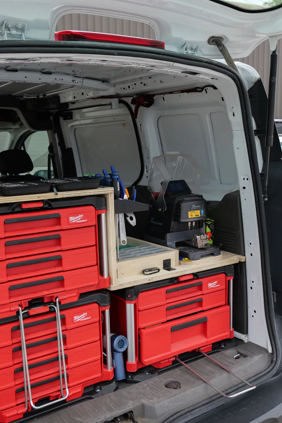 Inside the Key Rescue Washington 24-hour mobile locksmith van in Spokane, WA — tool drawers, key machine and programming gear